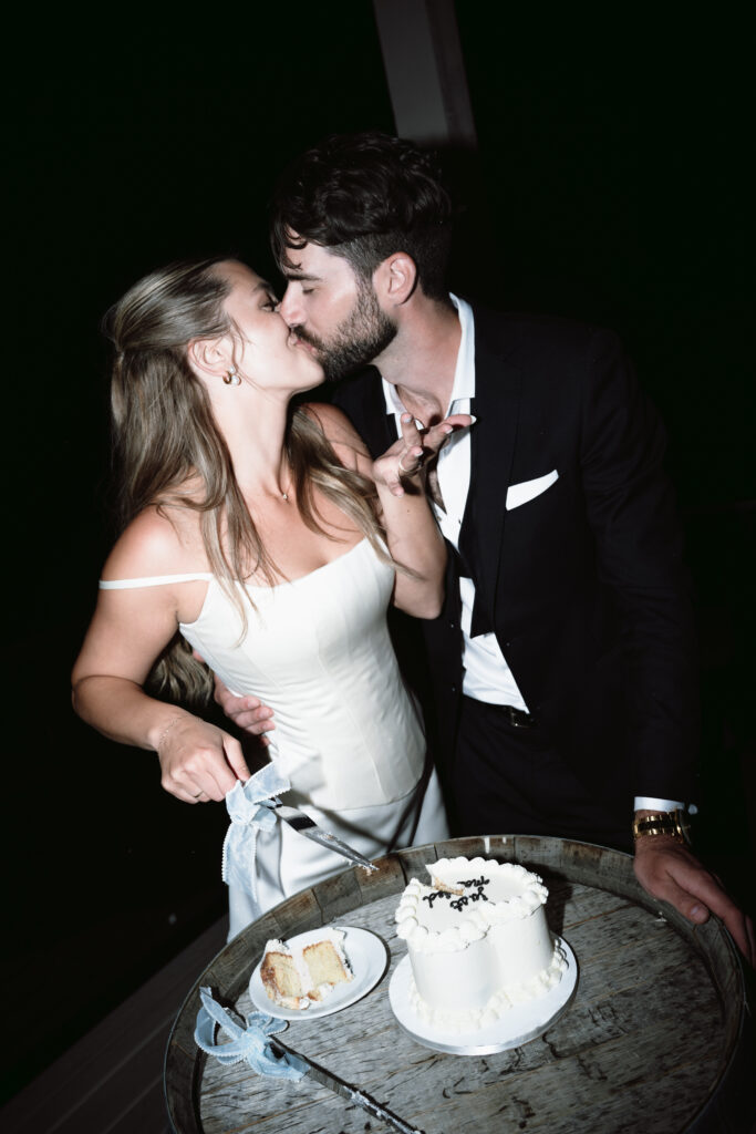 Outdoor wedding ceremony at Vows and Vines Vineyard overlooking Okanagan Lake in Penticton BC