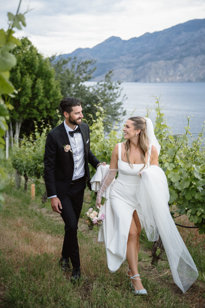 Outdoor wedding ceremony at Vows and Vines Vineyard overlooking Okanagan Lake in Penticton BC