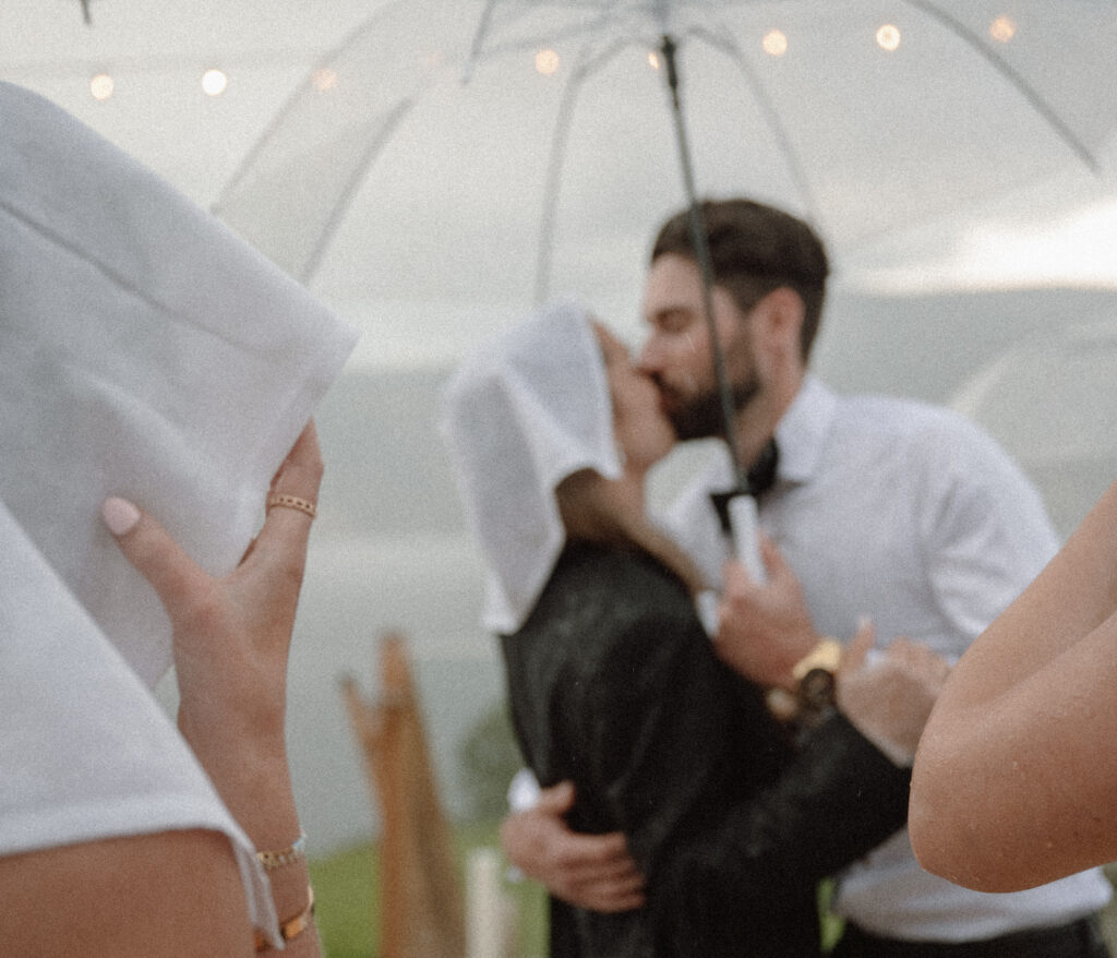 Outdoor wedding ceremony at Vows and Vines Vineyard overlooking Okanagan Lake in Penticton BC